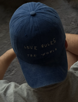 Cap 'love rules the world'